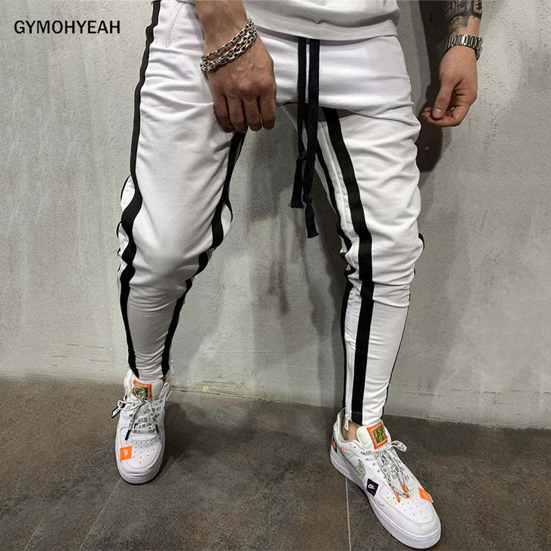 Pantalone tuta con doppia banda laterale