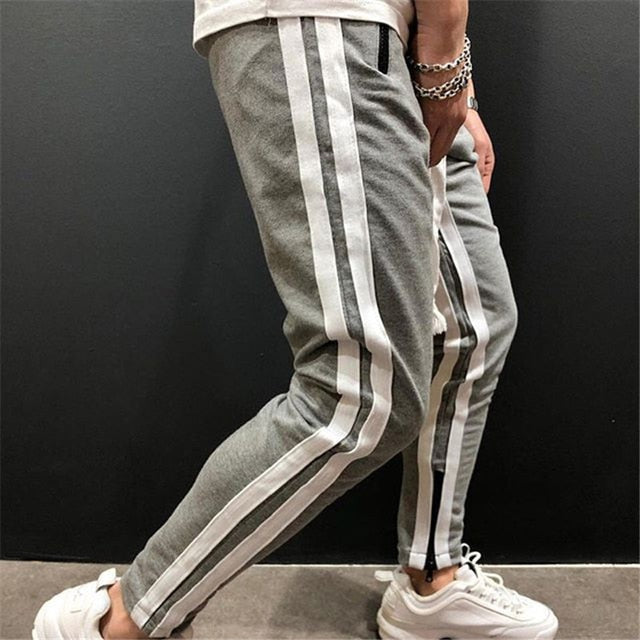 Pantalone tuta con doppia banda laterale