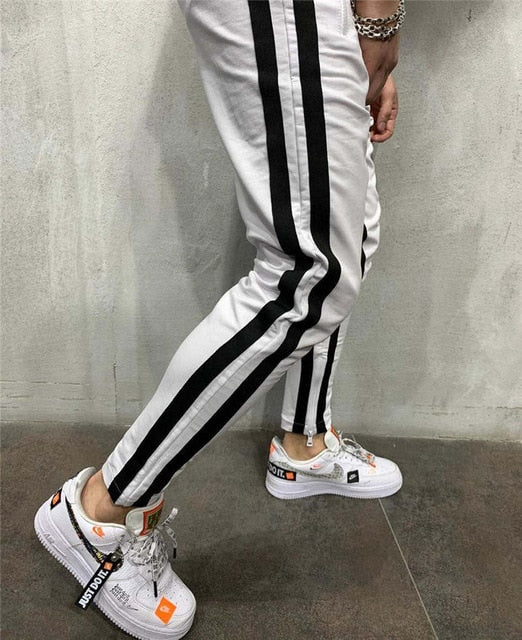 Pantalone tuta con doppia banda laterale