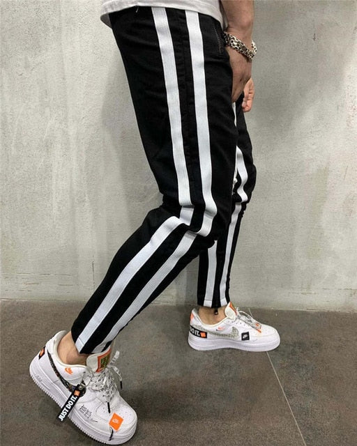 Pantalone tuta con doppia banda laterale