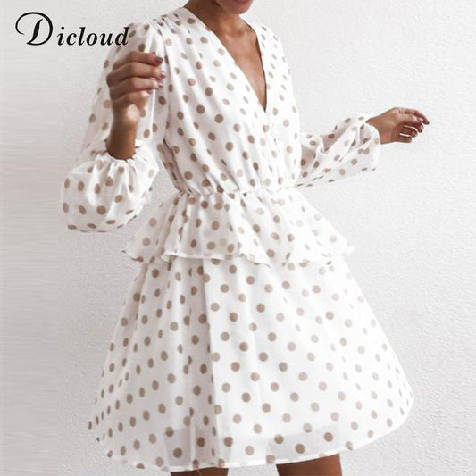 Vestitino a pois con scollo a V