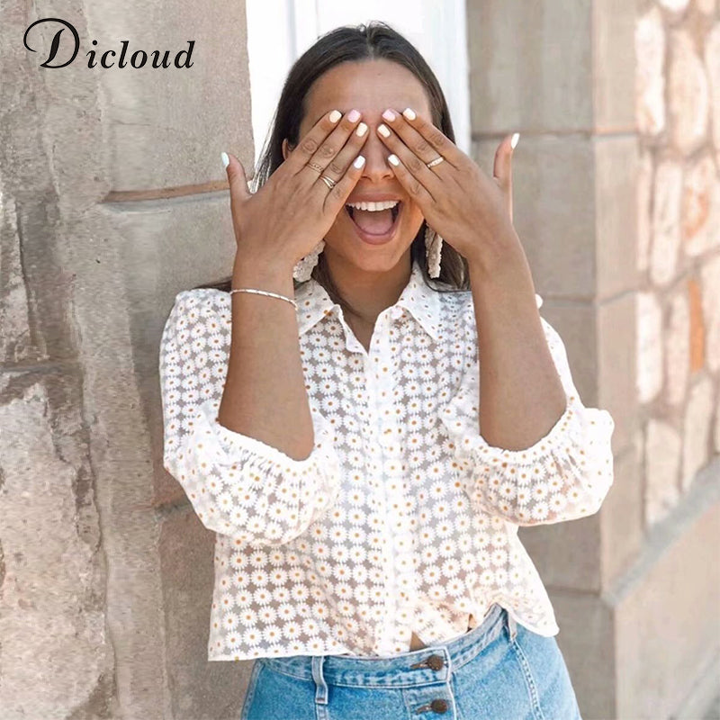 Camicetta semi trasparente con stampa a girasoli