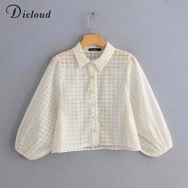 Camicetta semi trasparente con stampa a girasoli