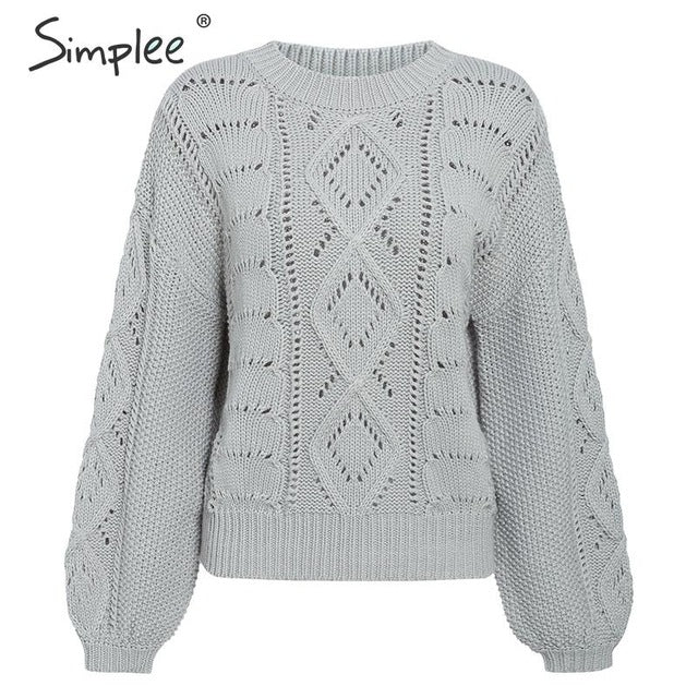 Maglione con disegno ricamato a rombi