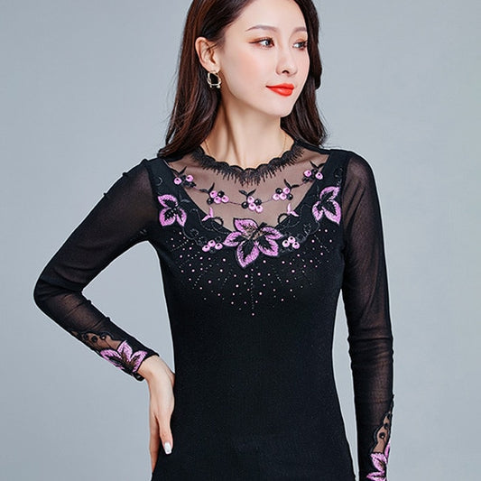 Maglia a maniche lunghe trasparenti con disegno floreale