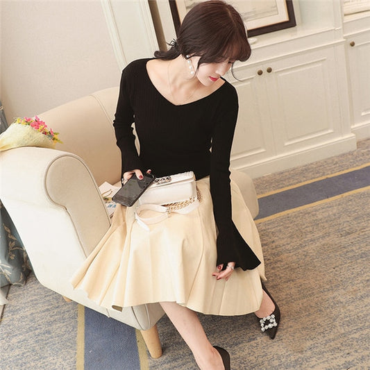 Maglia a maniche lunghe con manica a sbuffo