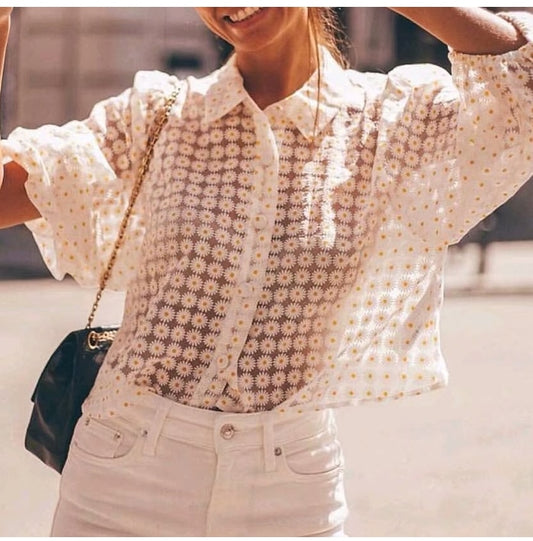 Camicetta semi trasparente con stampa a girasoli