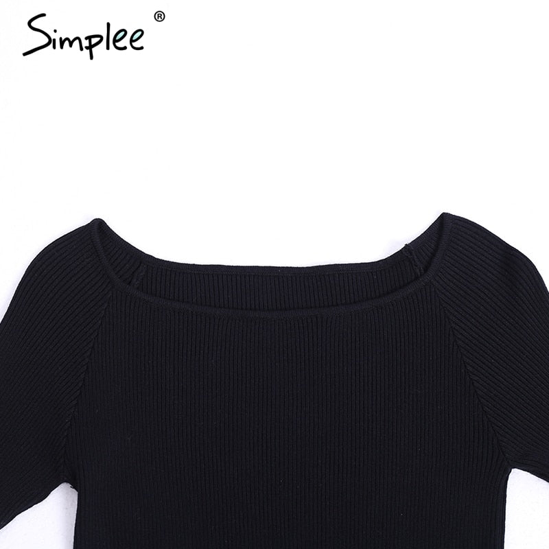 Maglia a maniche lunghe con spalle scoperte e bordi scuciti