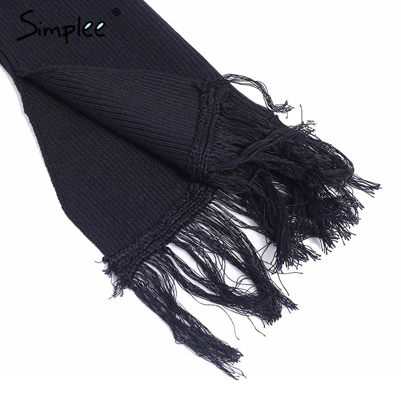 Maglia a maniche lunghe con spalle scoperte e bordi scuciti