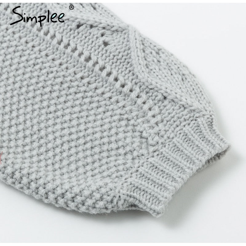 Maglione con disegno ricamato a rombi