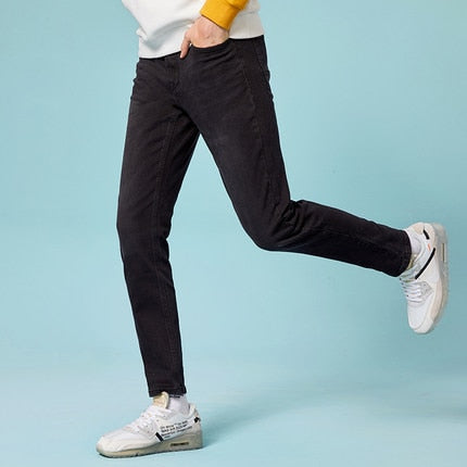 Jeans Slim Fit con risvoltino e chiusura a zip