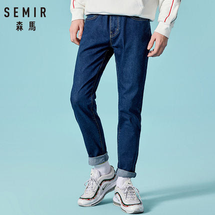 Jeans Slim Fit con risvoltino e chiusura a zip