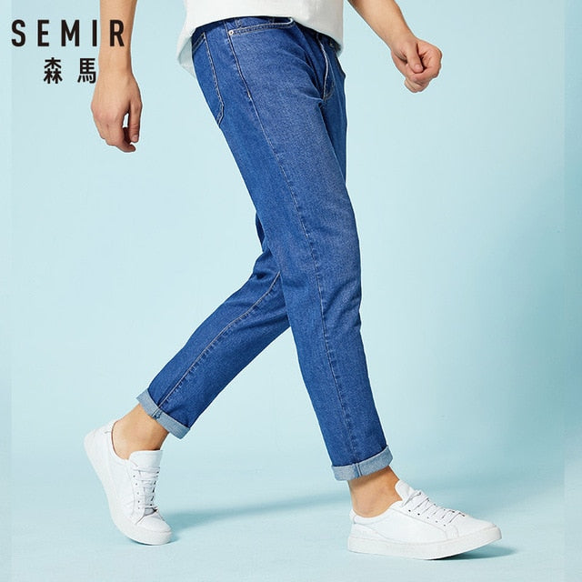 Jeans Slim Fit con risvoltino e chiusura a zip