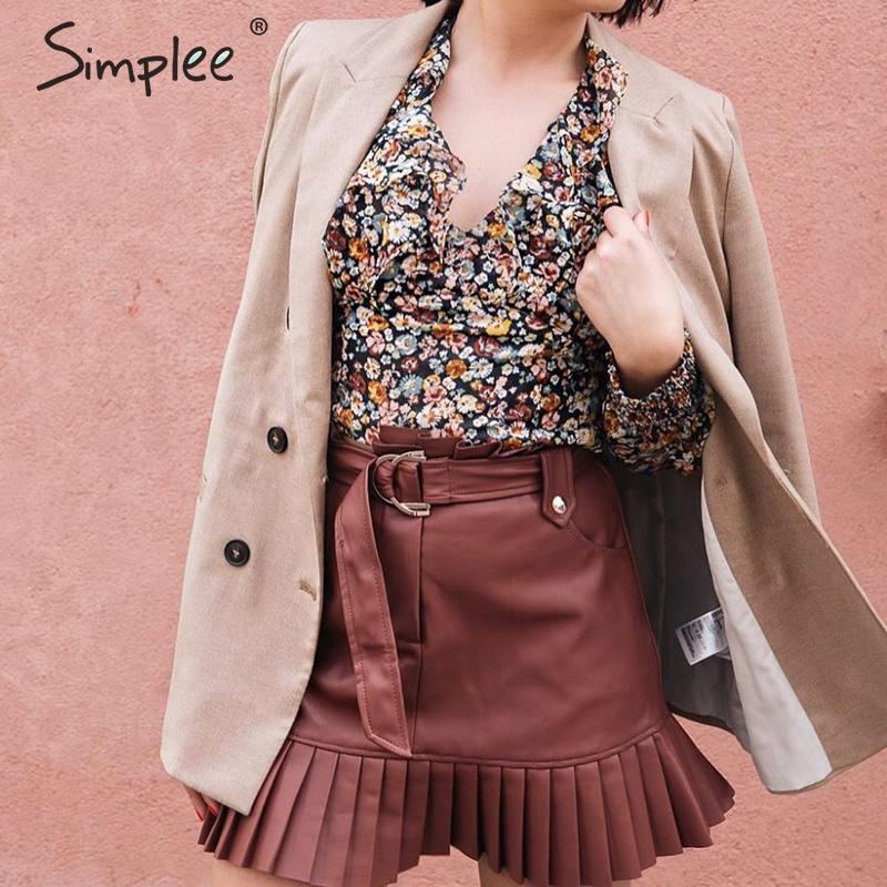 Gonna corta in ecopelle con cintura