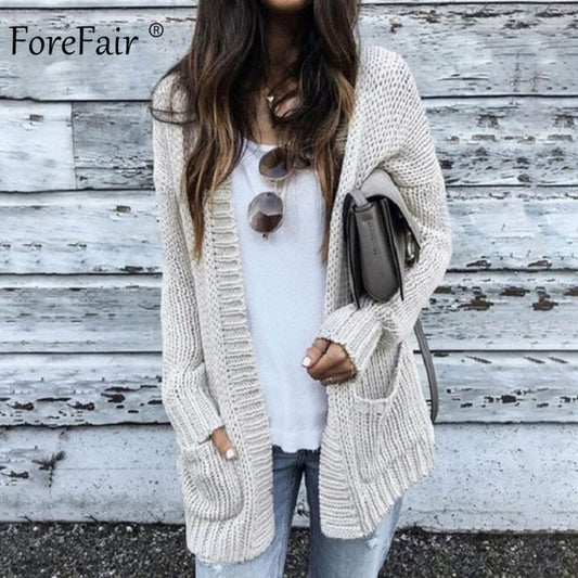 Maglia lunga aperta con tasconi