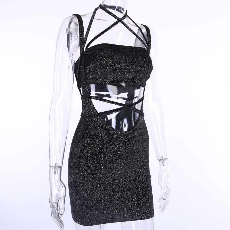 Vestitino corto glitterato con petto scoperto a fascia