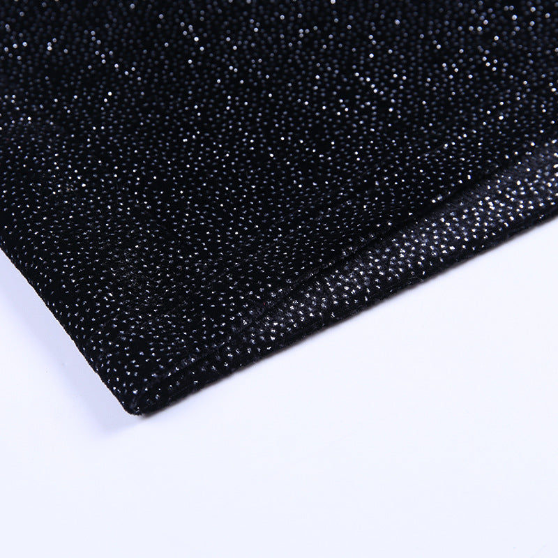 Vestitino corto glitterato con petto scoperto a fascia