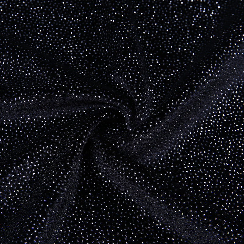 Vestitino corto glitterato con petto scoperto a fascia