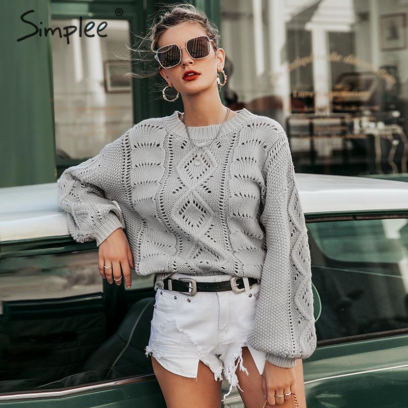 Maglione con disegno ricamato a rombi