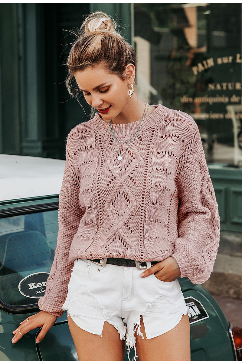 Maglione con disegno ricamato a rombi