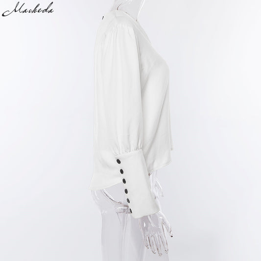 Maglia a maniche lunghe con bottoni sul retro e sulle maniche