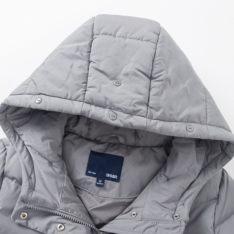 Cappotto lungo con cappuccio e tasche laterali