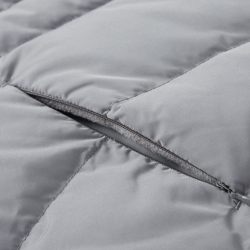 Cappotto lungo con cappuccio e tasche laterali