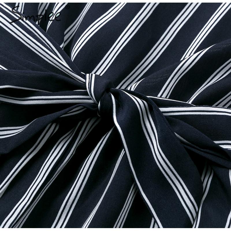 Tuta a righe verticali con chiusura a nodo