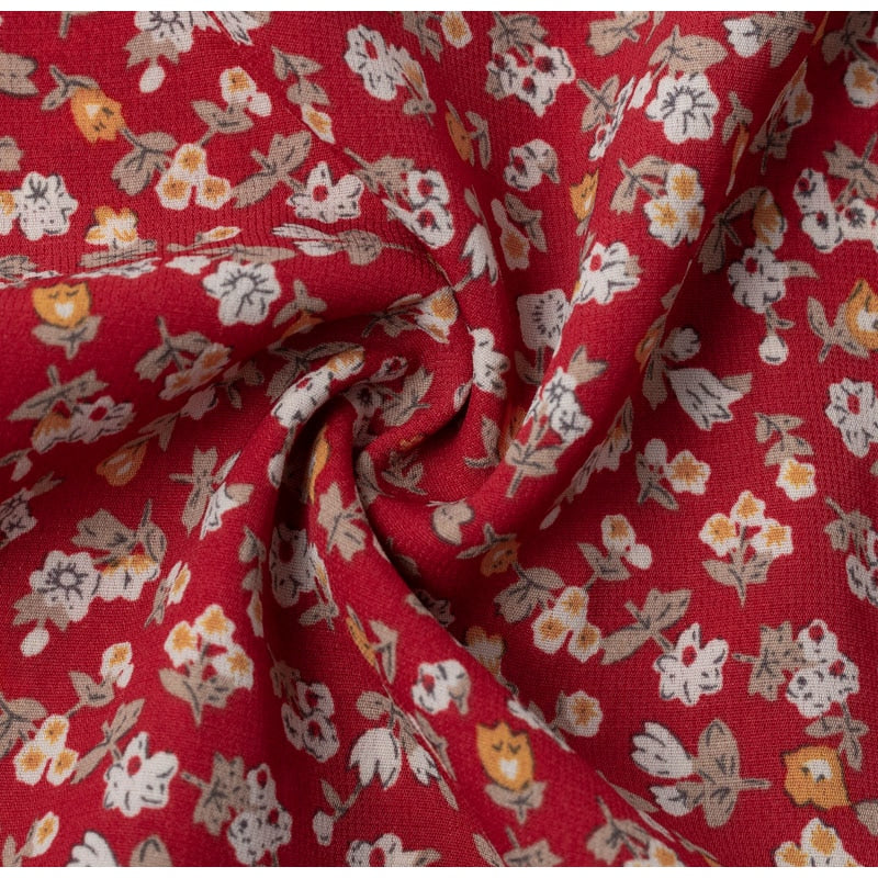 Gonna midi a pieghe con stampa a pois