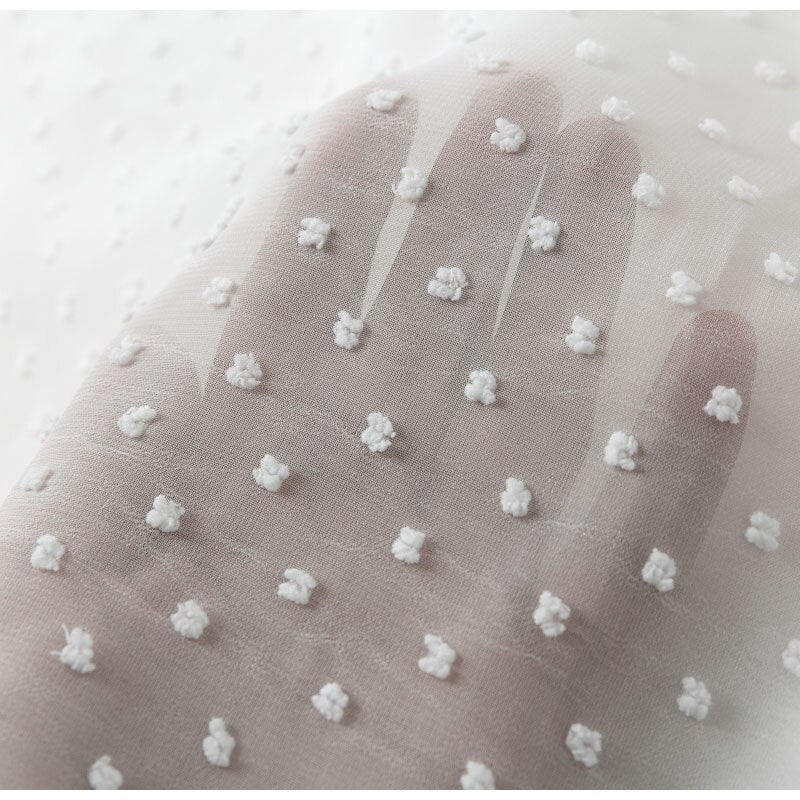 Maglia a manica lunga con disegno a pois