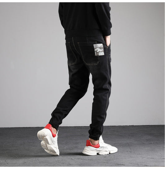 Jeans a vita bassa tasca America con tascone frontale