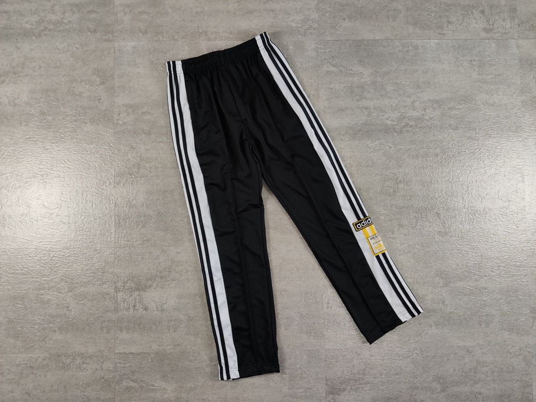 Adidas cheap pantaloni bottoni